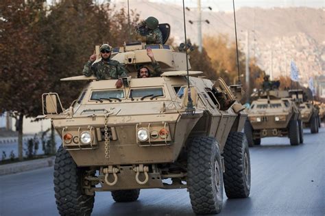 The Taliban Are Holding A Military Parade With Us Weapons And Armored