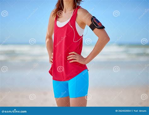 Runner Woman Beach Fitness And Music With Earphones For Podcast