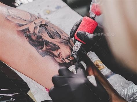 Tattoo Artist At Work Stock Photo By Kohanova Photodune