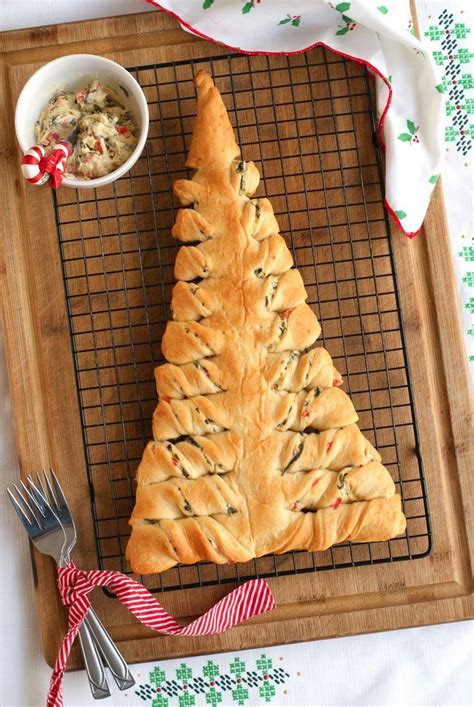 Garnish with chopped red and green bell peppers for extra holiday flare. Spinach Dip Stuffed Crescent Roll Christmas Tree | The Two Bite Club | #Christmas #appetizer ...