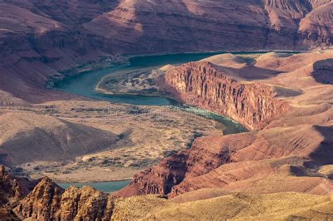 The Colorado River Glows In The Last Sunlight Over Grand Canyon Stock