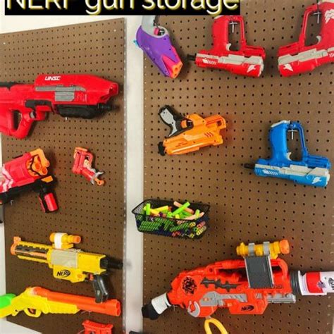 Check out this easy diy pegboard nerf gun rack! DIY Pegboard NERF Gun Storage - Moments With Mandi