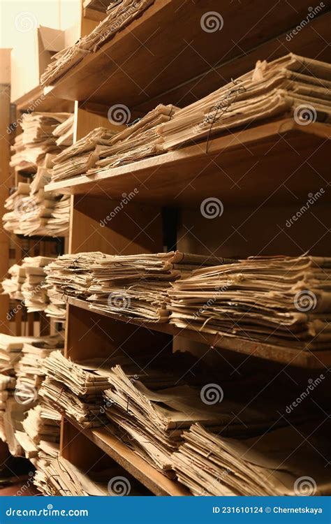 Collection Of Old Newspapers On Shelves In Library Stock Photo Image