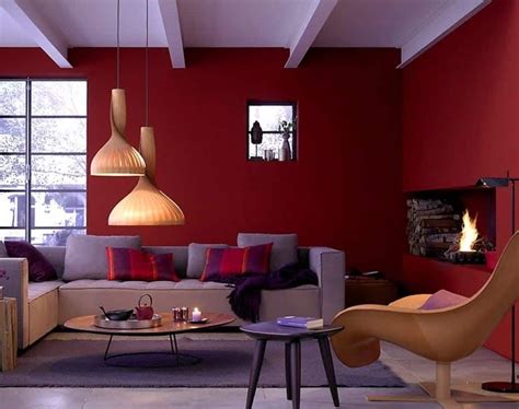 Living Room With Hanging Pendants And Burgundy Walls Burgundy Walls