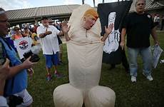 trump penis giant donald dressed costume people mask yuge trolls symbol however sorts provokes reactions primary such display seen republican