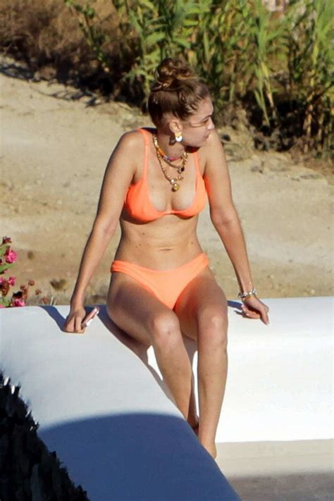Gigi Hadid Wears An Orange Bikini While Enjoying The Sun With Mary
