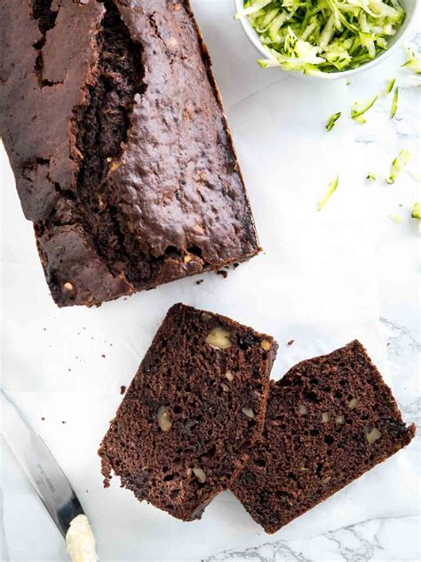 This bread is very quick and easy to make, it takes just 5 minutes of preparation time and an hour in to ease kids into the idea of zucchini bread try adding a handful of chocolate chips into the first few finally stir in the chopped walnuts and shredded zucchini. Moist Chocolate Zucchini Bread Recipe with Walnuts