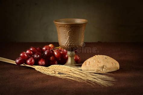 Communion Table With Wine Bread Grapes And Wheat Cup Of Wine Red