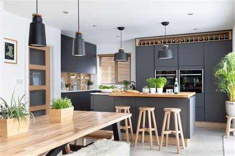 Shaker kitchens never date and look wonderful in both contemporary and traditional homes. Stunning modern handleless kitchen mixing dark grey and ...