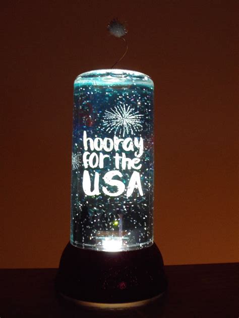A Glass Jar With Fireworks On It And The Words Hooray For The Usa