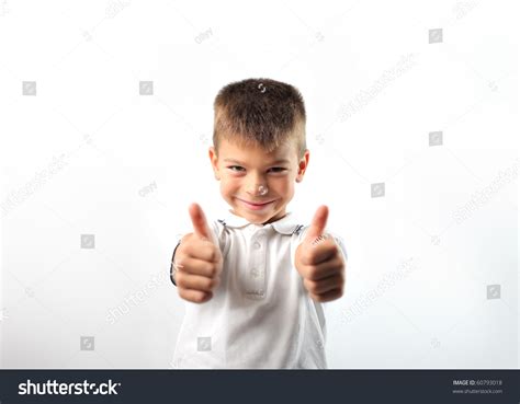 Smiling Child With Both Thumbs Up Stock Photo 60793018 Shutterstock