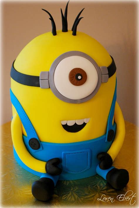 I next insert two bamboo skewers into the layers of cake to keep the entire minion cake together. Despicable Me Minion! | Minion cake, Minions, Kids cake