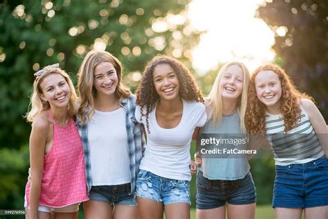 Friends Hanging Out At The Park High Res Stock Photo Getty Images