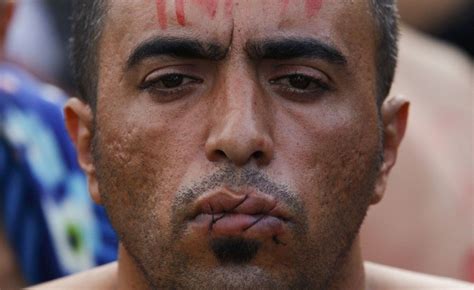 migrant crisis iranians sew lips shut in border protest bbc news