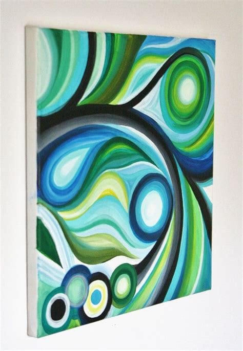 An Abstract Painting With Blue Green And White Swirls In The Center On