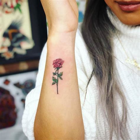 Red Rose Tattoo On The Right Forearm