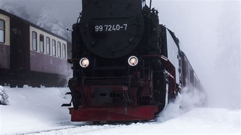 Download Wallpaper 1366x768 Train Locomotive Smoke Snow Black