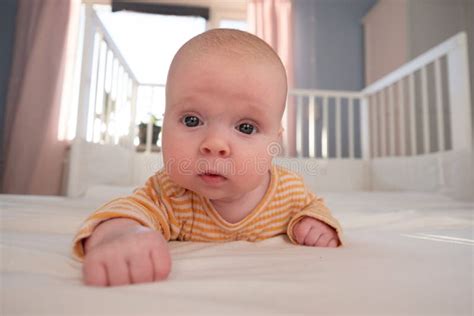 Funny Caucasian Baby Lying On The Bed Stock Image Image Of Child