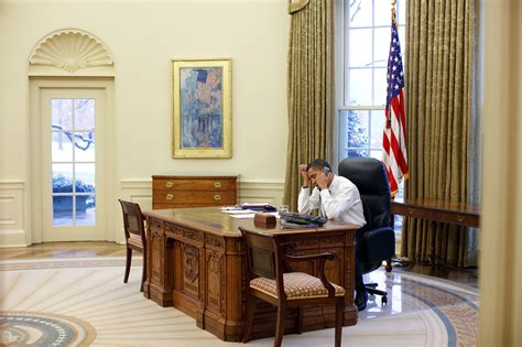 File:Barack Obama working at his desk in the Oval Office.jpg