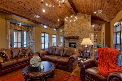 Rustic Living Room Features Brown Leather Furniture Hgtv