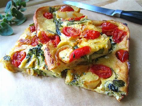 An egg fried in a slice of toast that has a hole in the center. Vegetable Toad in the Hole