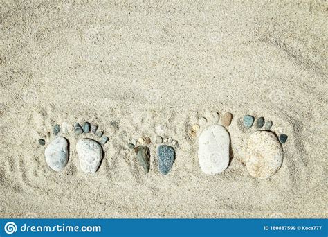 Happy Feet The Stone Is Located Like Footprints On The Beach By The