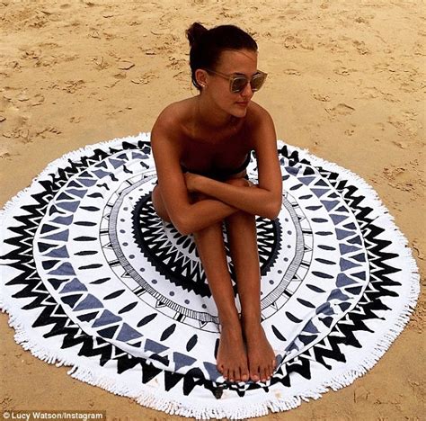 Lucy Watson Tops Up Her Tan In Black Bikini During Festive Sydney Break