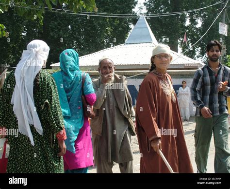 Kashmir People Women Traditional Dress Copyright © Saji Maramon Stock