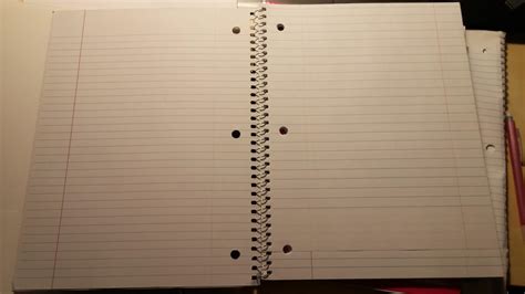 A Single Page In My College Ruled Note Book Is Upside Down Cropped
