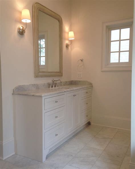 How install marble tile backslash on vanity.with awesome. love the backsplash idea via @davisconstructionservices ...