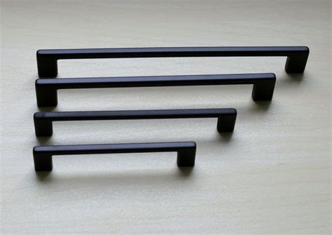 Cabinet and drawer pulls are often called the jewelry of the kitchen. Modern Black Cabinet Pull. Black Cabinet Hardware ...
