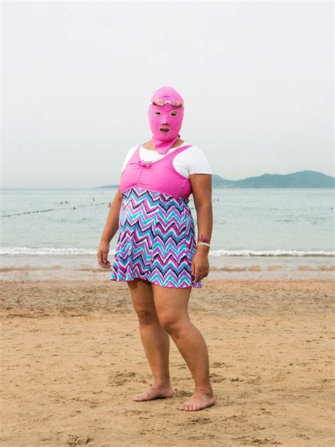 Tanned Skin Is So Frowned Upon In China That Women Wear These Crazy