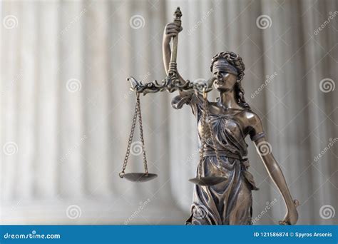 Justice Blindfolded Lady Holding Scales And Sword Statue Royalty Free