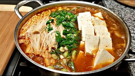 When the green onions and onions are fried, fry with spam and cabbage. KIMCHI JJIGAE | How I Make Kimchi Jjigae | Homemade Korean ...