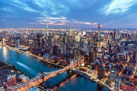 - Aerial of Midtown Manhattan with Empire state building at dusk, New York, USA - Royalty Free ...