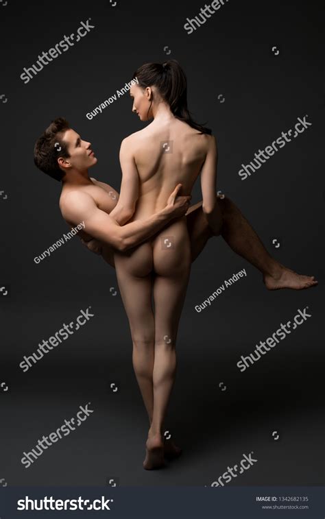 Nude Woman Carrying Nude Man Her