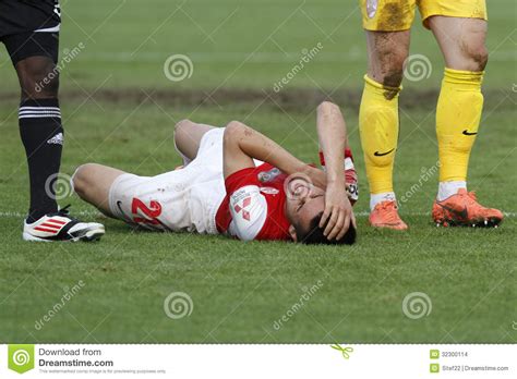 Injured football player editorial stock image. Image of injured - 32300114