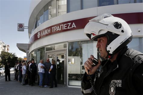 Cyprus Banks Reopen Tight Withdrawal Limit Heavy Security Prevents