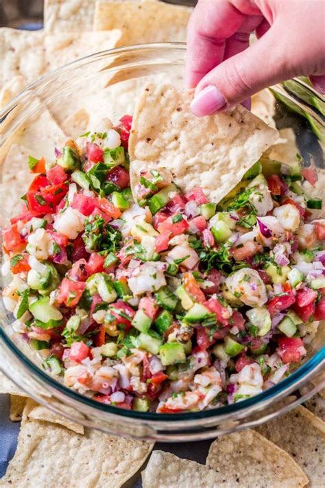 The shrimp will cook and turn pink. Quick and EASY Shrimp Ceviche recipe. Shrimp with cucumbers, avocado and tomatoes in lime juice ...