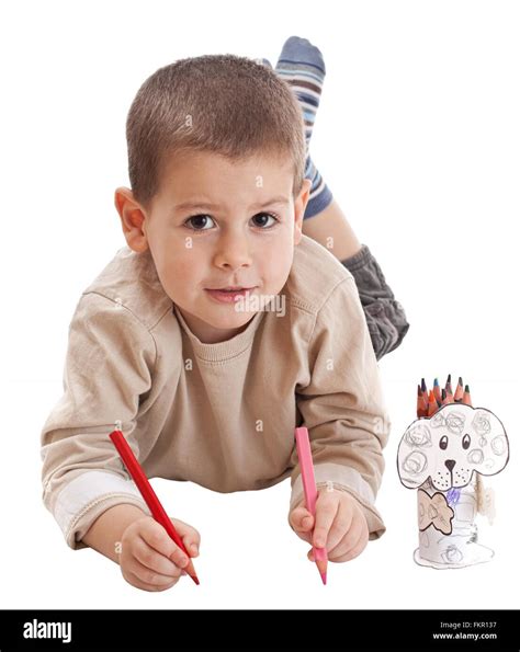 Little Boy Drawing With Two Pencils Stock Photo Alamy