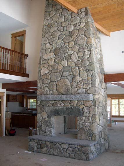 Pass Through Fieldstone Fireplace With Antique Granite Lintel And
