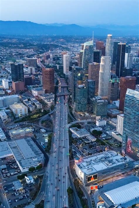 The Downtown Los Angeles California And The City Traffic At Dusk