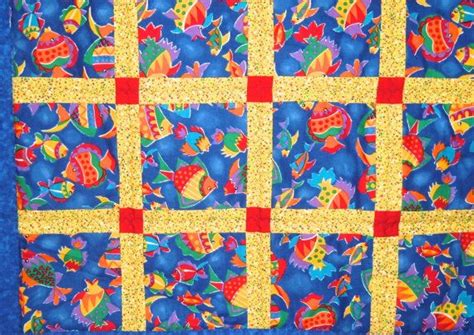 Some insects are brightly colored to scare away predators or to notify them that they are poisonous. Baby Quilt Brightly Colored With Fish For Boys Or Girls ...