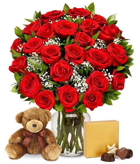 Basket arrangement of yellow flower like roses , gerberas and carnation along with celebration chocolate pack. Two Dozen Red Roses with Godiva Chocolates & Bear at From ...