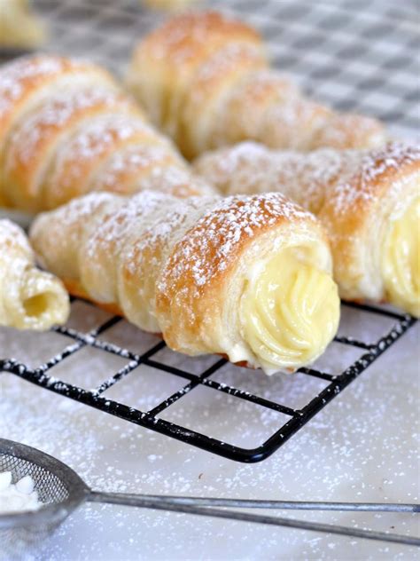Rispy and buttery puff pastry cannoncini (italian cream horns) filled with rich custard cream Italian Cream Stuffed Cannoncini (Puff Pastry Horns) (With ...