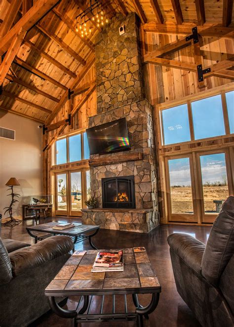 Interior Rustic Lodge Great Room With Scenic View And Fireplace Lodge