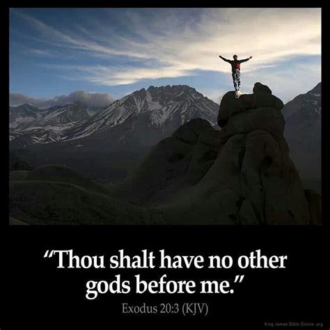 A Man Standing On Top Of A Mountain With A Bible Verse Above Him That