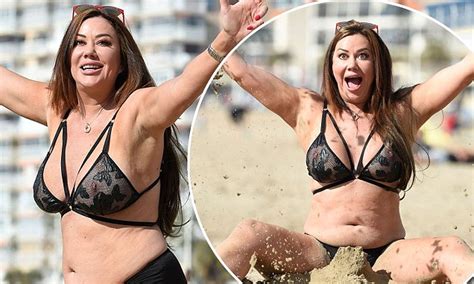 Lisa Appleton Flashes A Nipple In Sheer Bikini Top Daily Mail Online