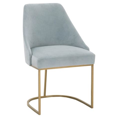 Same fabric is used to upholster the legs, creating a cohesive look. Patricia Modern Brushed Gold Blue Velvet Upholstered ...