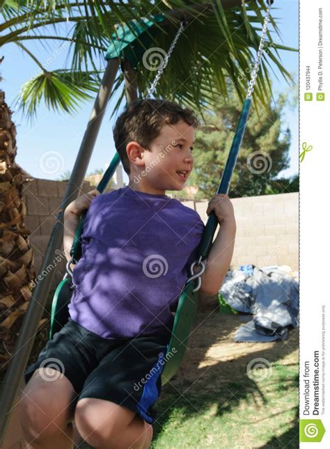 Young Boys Swings On A Swingset Stock Photo Image Of Recreation
